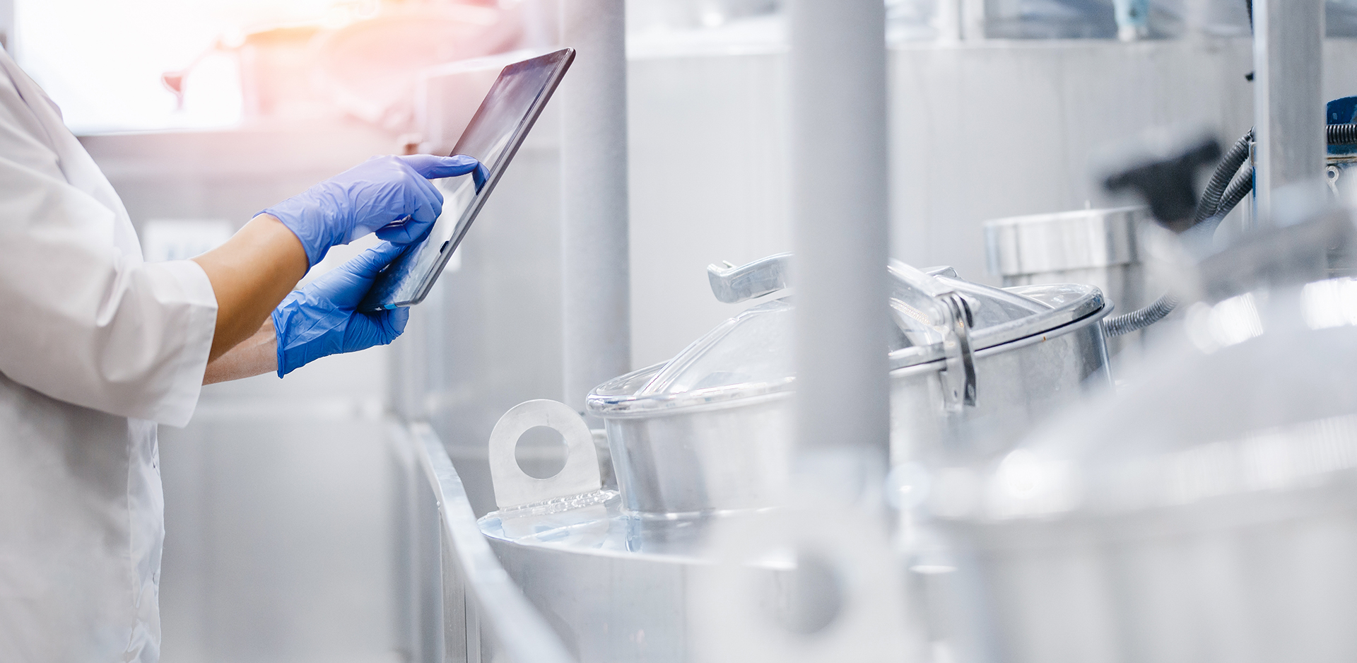 Food and beverage production line managed through Syspro distribution software for traceability and process control.